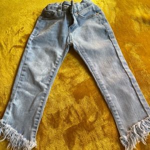 Flared fringe jeans
